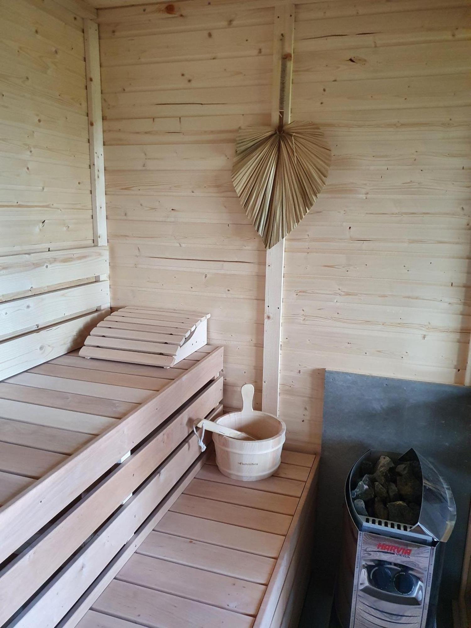 Idyllisches Blockbohlenhaus mit eigenem Garten und Sauna zum Wohlfühlen Martensrade Exterior foto